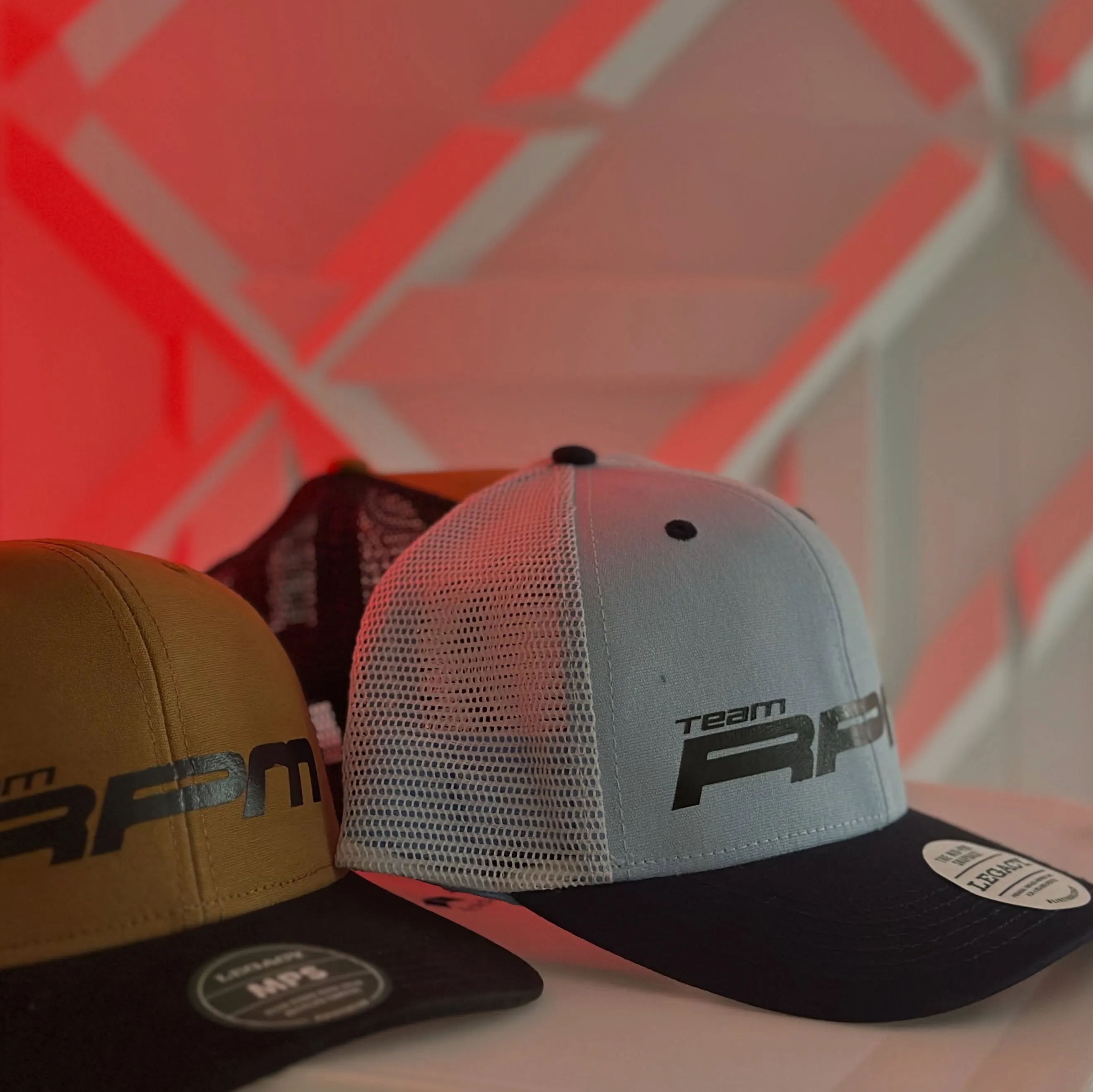 TEAM RPM fitted caps laid out