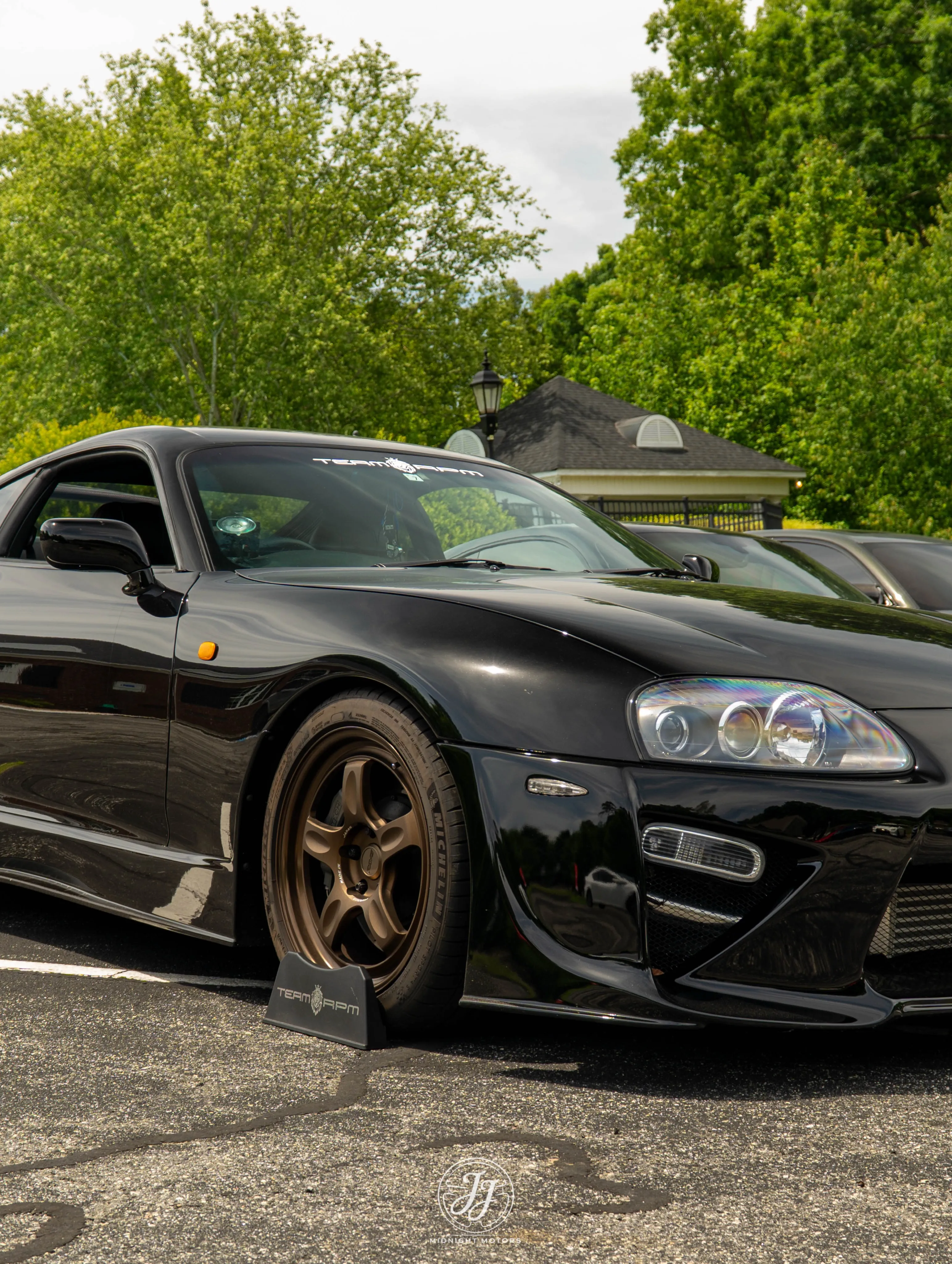 Black Toyota Supra MK4, second angle