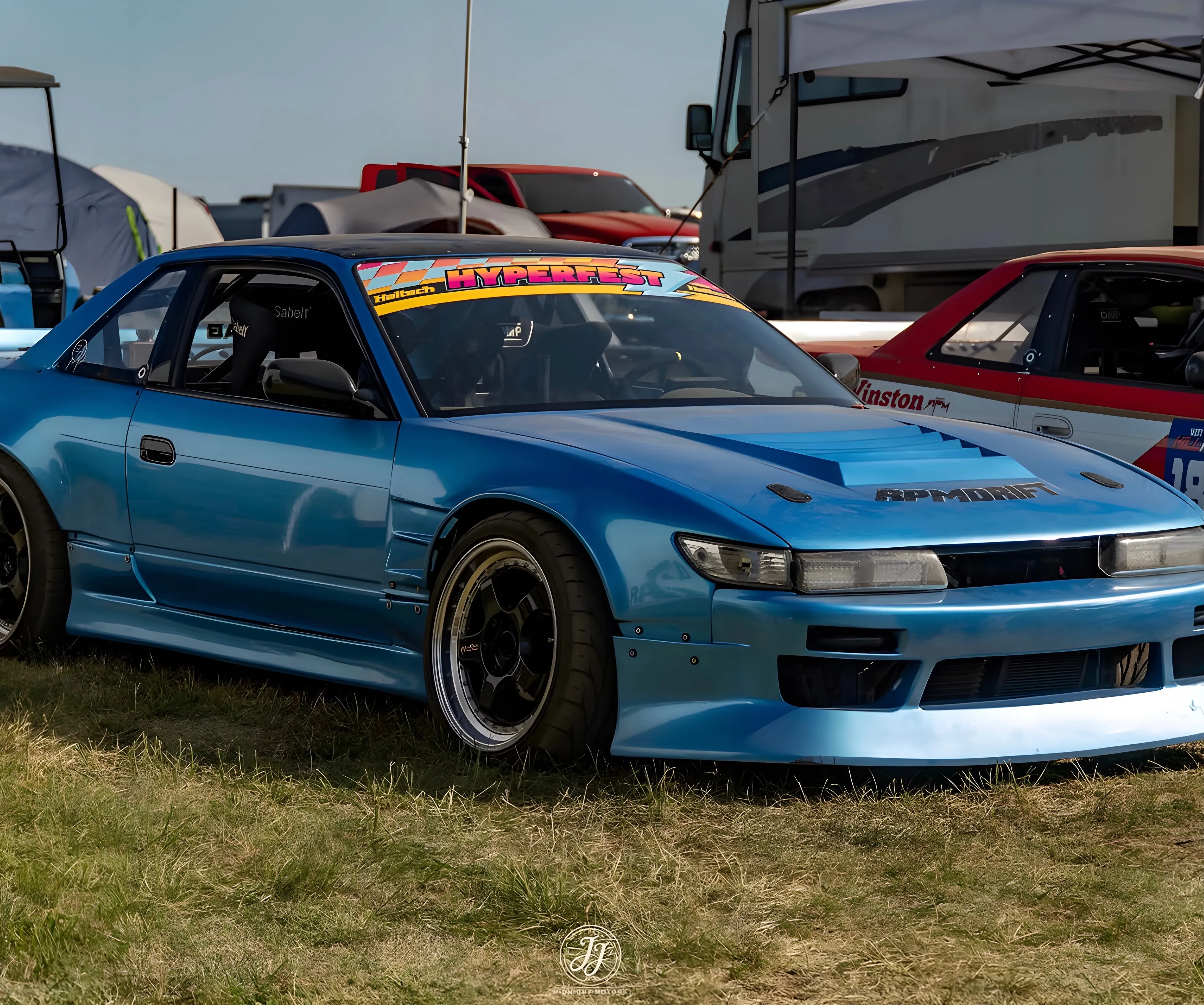 Blue Nissan S13 in the VIR paddock